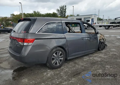 2015 Honda Odyssey Touring from USA, damaged, VIN 5FNRL5H90FB129008